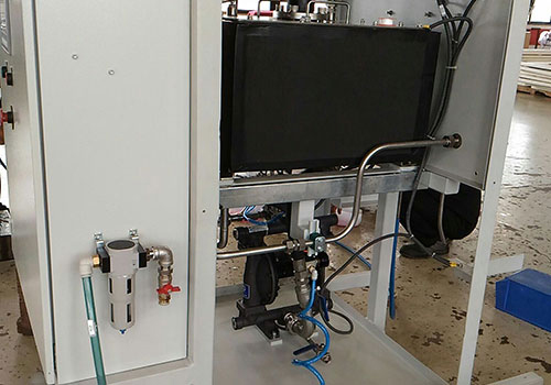 The image depicts an automatic lubrication system