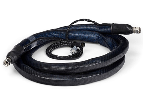 Image of stainless steel-sheathed PTFE heated hose designed for hot melt applications