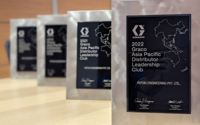 Showcasing an award from the 2022 Graco Asia Pacific Distributor Leadership Club.